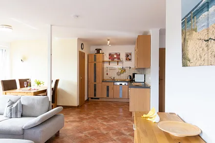 Wohnzimmer mit integrierte Küche