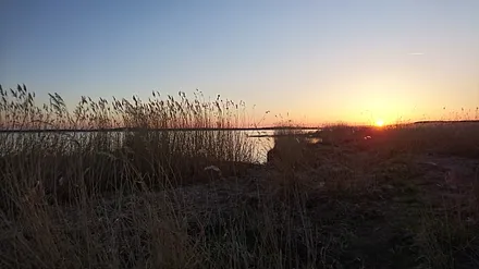 Sonnenuntergang am Achterwasser