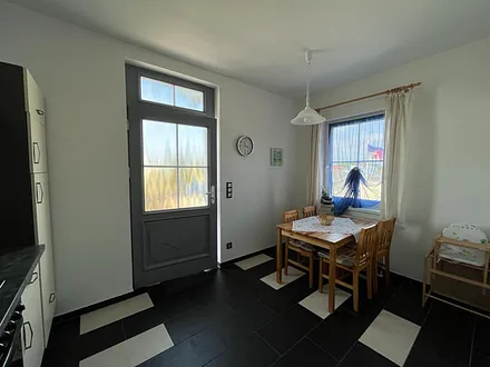 Küche mit Esssitzgruppe