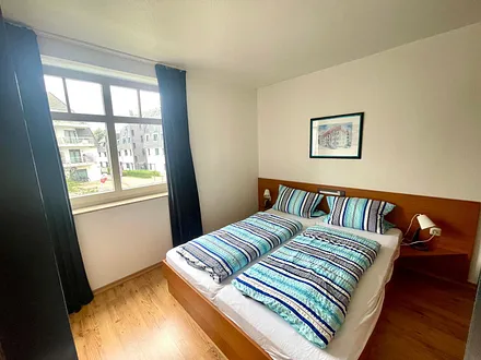 Schlafzimmer mit Doppelbett