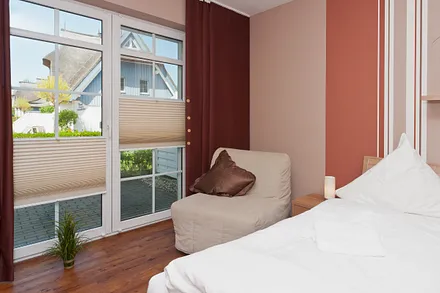 Die gemütliche Leseecke im Schlafraum läßt sich zum Schlafplatz für die dritte Person verwandeln