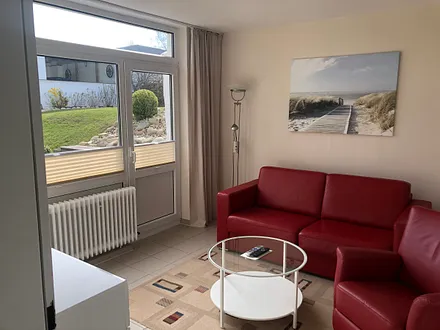 Wohnzimmer mit Ausgang zur Terrasse