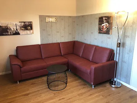 Wohnzimmer mit Schlafsofa