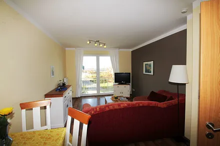 Wohn-/Essbereich mit Blick auf den Wieker Bodden