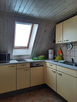 Küche befindet sich im oberen Bereich