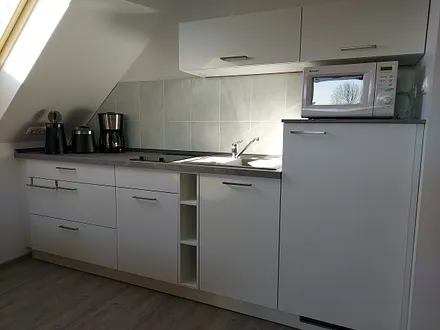 ... mit Küchenzeile