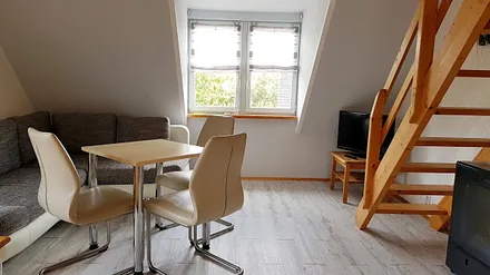 Wohnbereich mit Schlafcouch 