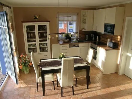 Wohnzimmer mit Küche