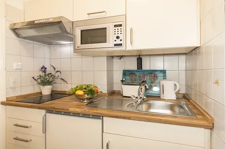 Villa See-Eck FeWo Erdgeschoss - Küchenzeile