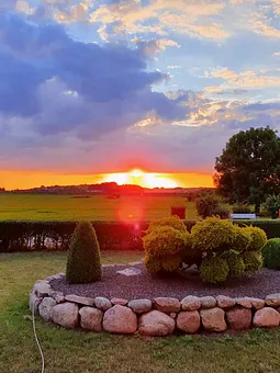 Sonnenuntergang vom Balkon anzusehen 