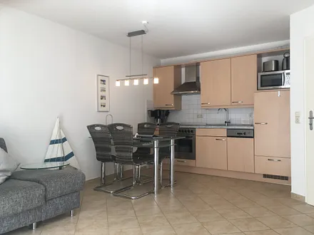 Die Küche mit Sitzgruppe