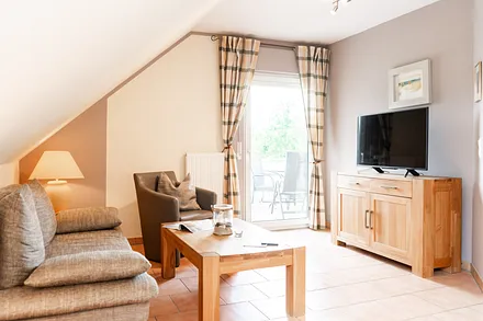 Wohnzimmer mit Ausziehcouch