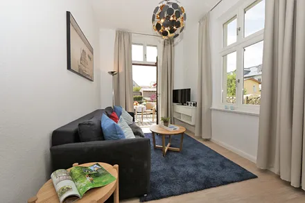 Wohnbereich mit Zugang zum Südbalkon