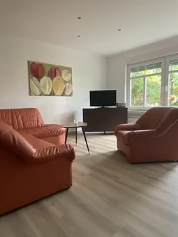 Wohnbereich mit Coutch,  TV und Radio  