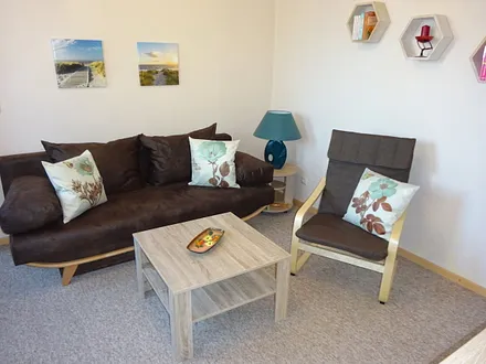 Wohnzimmer ( Aufbettungsmöglichkeit )