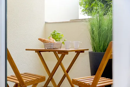 1. Schlafzimmer mit Balkon