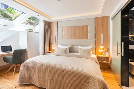 2. Schlafzimmer im Gartengeschoss mit Bad en Suite