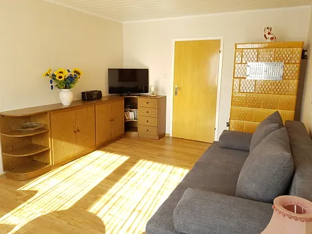 Wohnzimmer mit Kachelofen