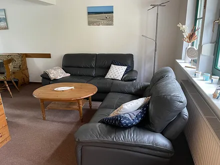 Wohnzimmer mit gemütlicher Sitzecke