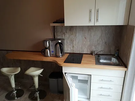 Pantry Küchenbereich und Balkon Zugang