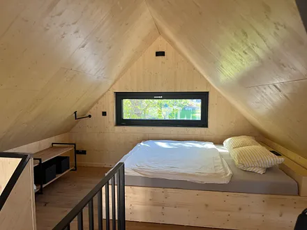 Galerie mit Doppelbett 