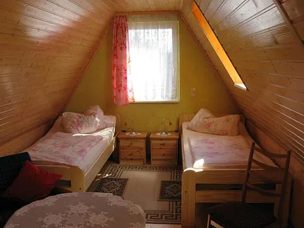 Schlafzimmer im Obergeschoss +Sitzecke