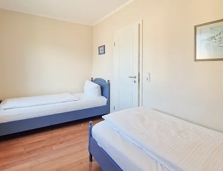 Schlafzimmer mit 2 Einzelbetten