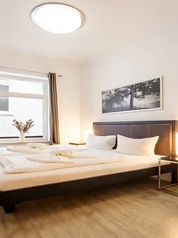 Schlafzimmer mit Doppellbett (180x200)