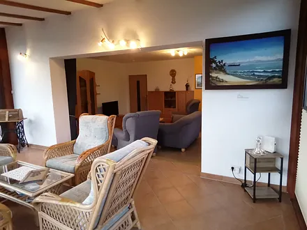 Wohnzimmer mit Wintergarten 