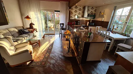 Wohnzimmer mit Küche