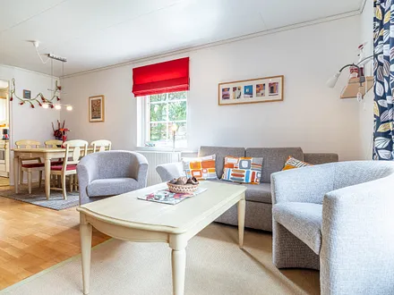 Ferienhaus Residenz zu den 3 Tannen Zingst - Wohn-, Ess- und Küchenbereich