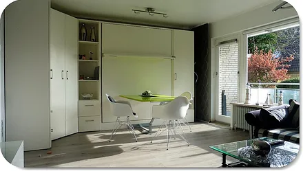 Wohnzimmer Schrankwand (2RaumWunder) Ausfahr-Doppelbett Komfortschaummatraze 1,60 x 2,00 m und integr. Eßtisch unterh. d. Betts autom. einklappend