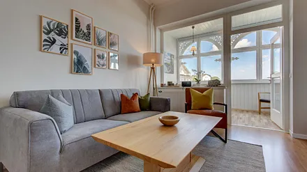 Wohn-Schlafzimmer mit Meerblick