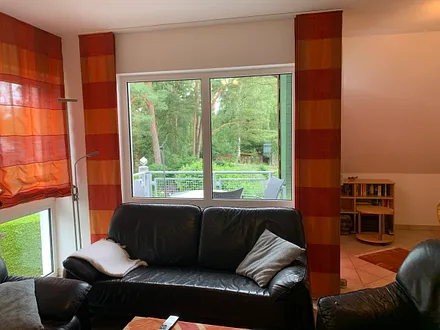 Wohnzimmer mit Blick in die Gärten