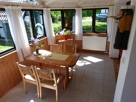 Wintergarten mit Essbereich