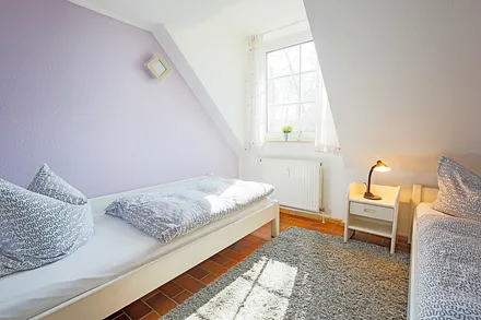 Schlafzimmer mit Einzelbetten