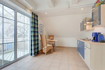 Wohnzimmer mit Küche