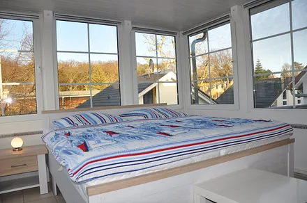 Wintergarten (Schlafzimmer 3) mit Doppelbett