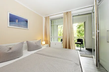 Schlafzimmer mit Balkon