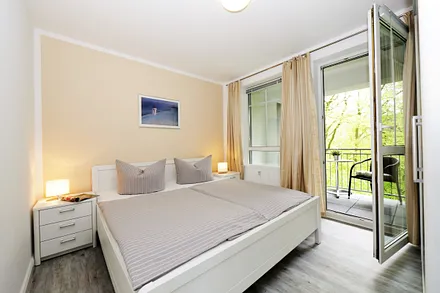 Schlafzimmer mit Balkon