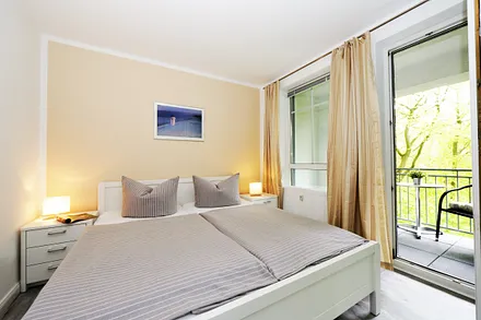 Schlafzimmer mit Balkon