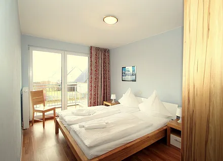 Schlafzimmer mit Balkon