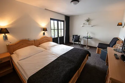 Doppelzimmer mit Balkon zum See 