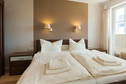 Sanfte Farben und Gemütlichkeit im Schlafzimmer