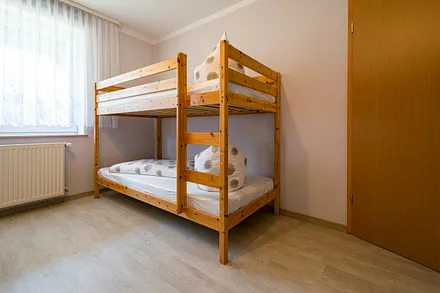 Schlafzimmer mit Hochbett