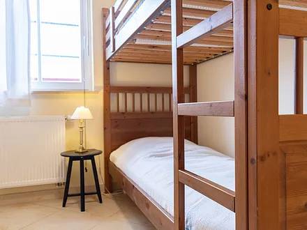 Das zweite Schlafzimmer mit Doppelstockbett