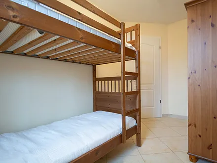 Das zweite Schlafzimmer mit Doppelstockbett