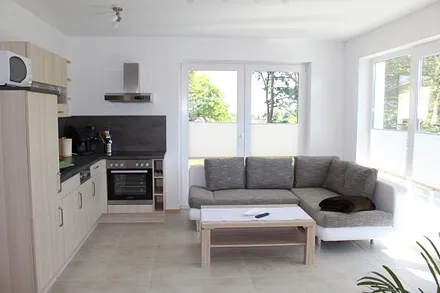 Küche mit Wohnbereich