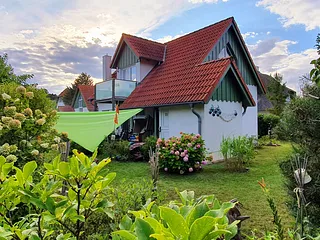 Bild: Ferienhaus mit 2 gemütlichen FeWo-barfuß zum Meer