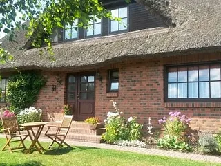 Bild: Landhaus unter Reet